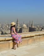 young-female-tourist-enjoying-beautiful-view-ancient-citadel-el-khalifa-egypt_181624-41992